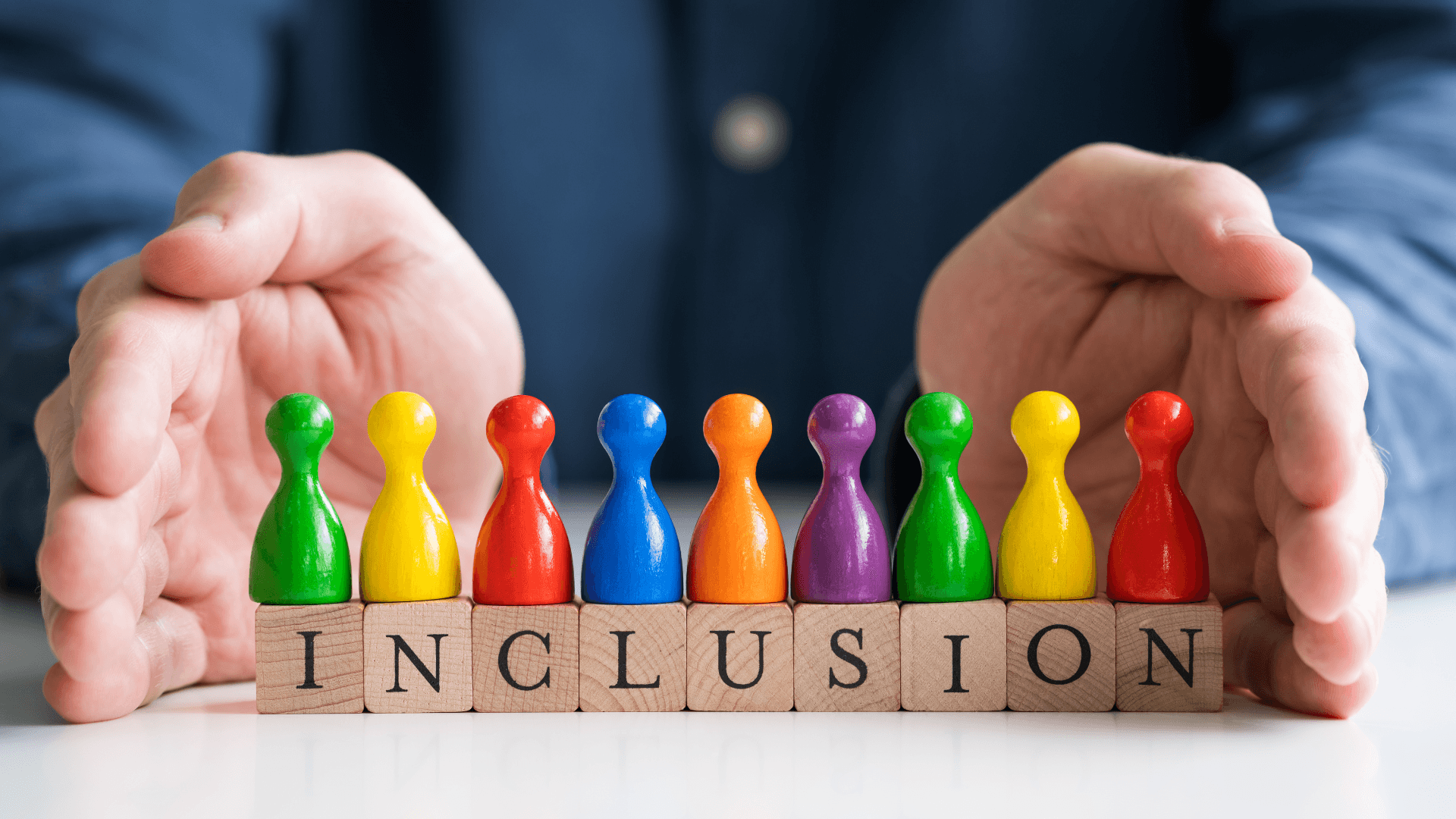 A diverse group of students collaborating and engaging in interactive learning activities in a modern, technology-infused classroom in Singapore.